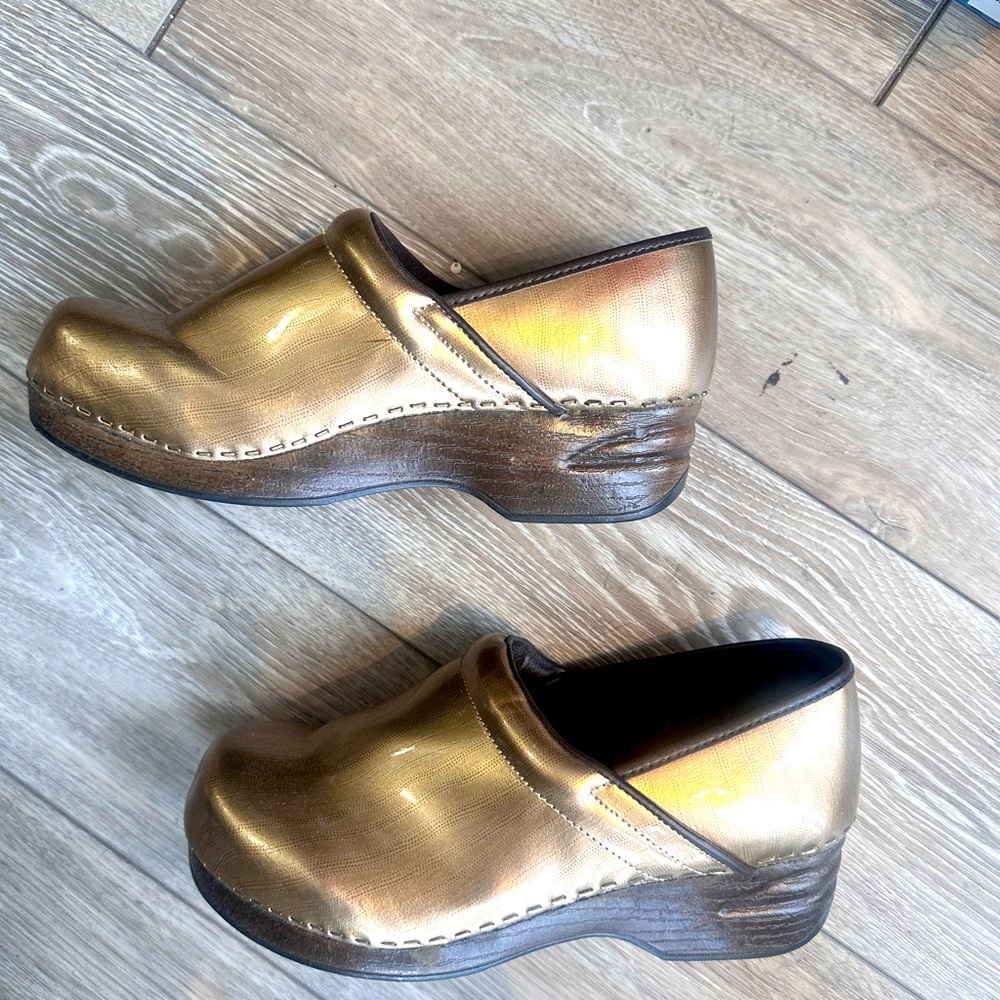 Metallic gold clogs